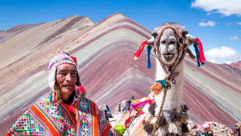 Farmer and his lama in Rainbow Mountain