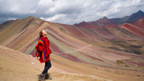 Happy women at Rainbow Mountain Peru