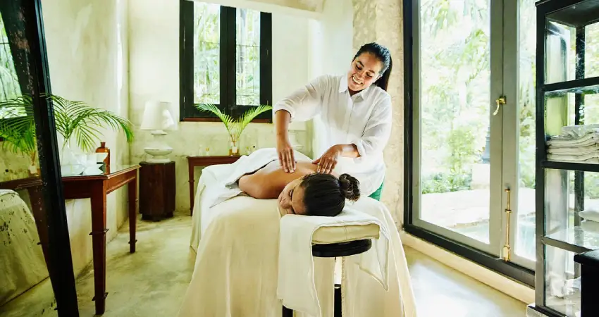 A woman receiving a relaxing massage in a serene spa, highlighted as the best spa in Lima.